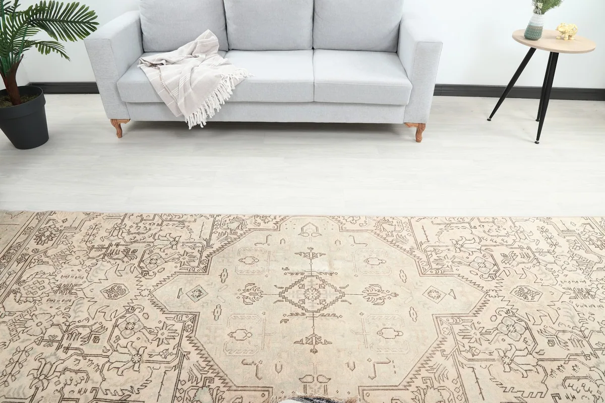 Overhead view of the vintage Anatolian runner rug centered in a room, highlighting its full length.