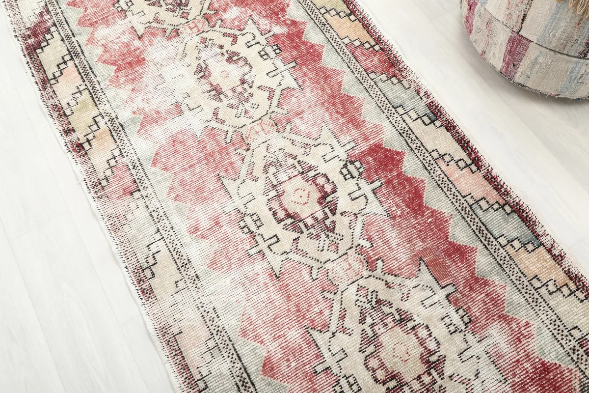 Diagonal view of the runner rug, emphasizing the overall design and color variations