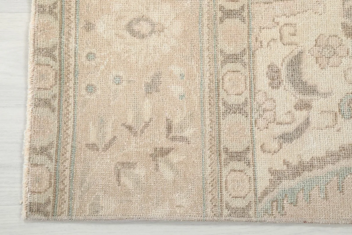 Close-up of the rug's border pattern and edge