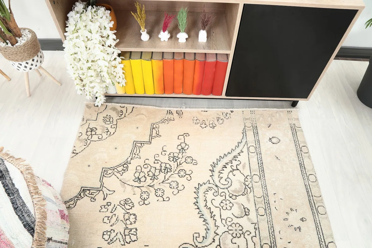 Overhead shot focusing on the rug's design and color variation across its surface