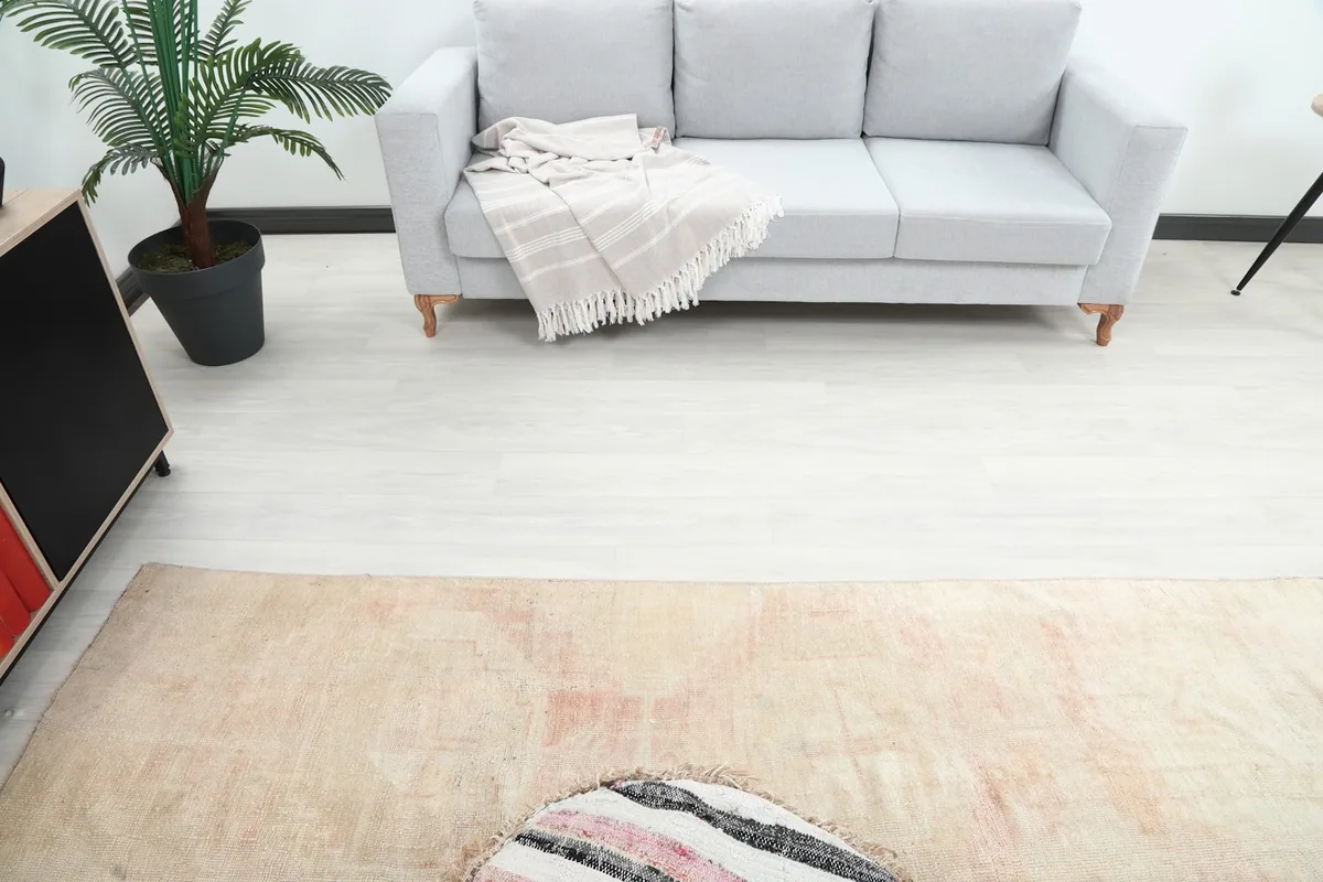 Overhead view of the rug in a room, showing its placement relative to furniture