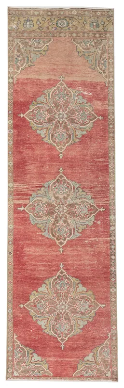 Full overhead view of the vintage rust Anatolian runner with three central medallions