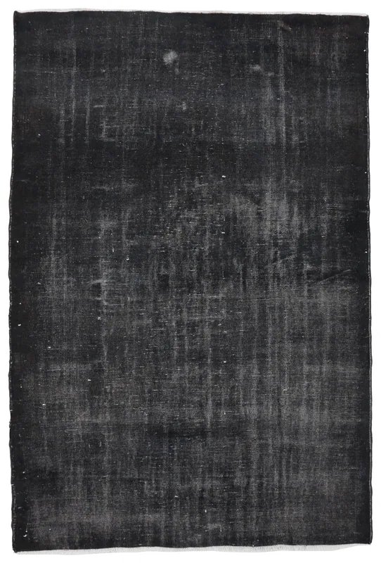 Full top view of the 6'4" x 9'7" charcoal distressed vintage Anatolian rug on a white background.