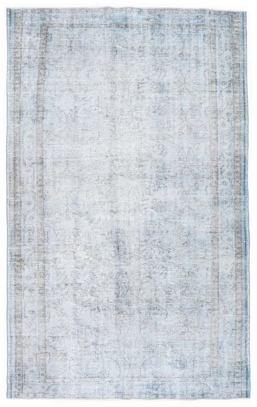 Full top view of the 5x9 vintage blue and gray Anatolian area rug