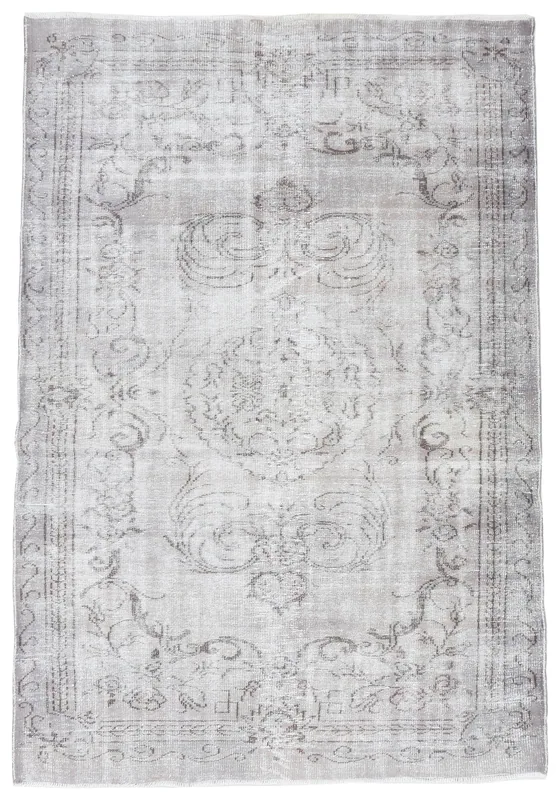 Full top view of the vintage gray Anatolian rug with central medallion pattern
