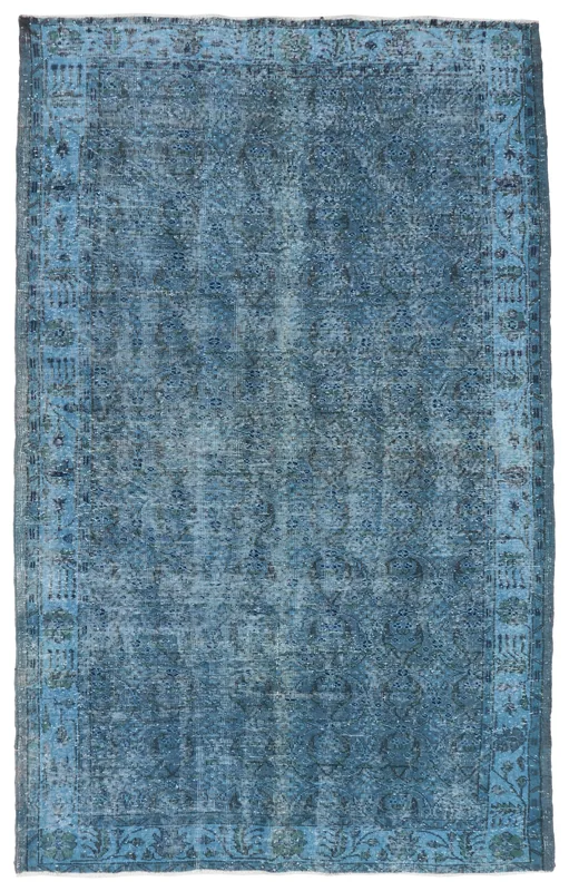 Full overhead view of the blue distressed vintage Anatolian area rug