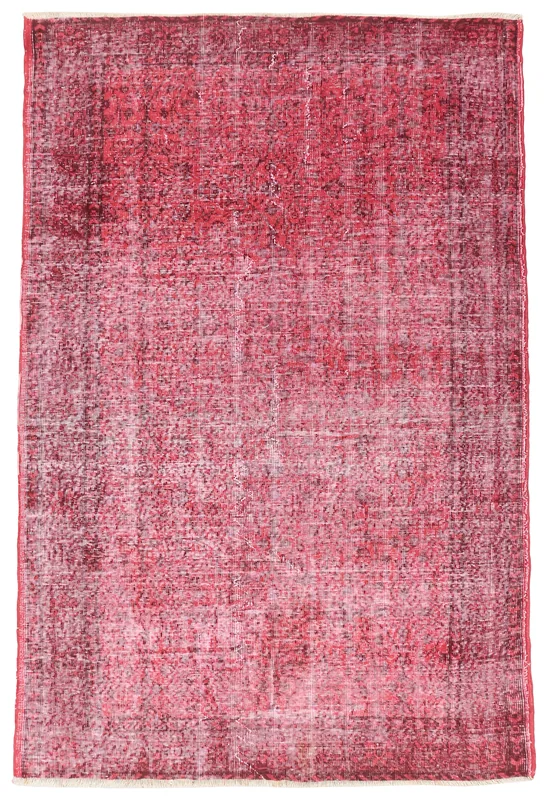 Full overhead view of the 5'1" x 7'8" rose distressed Anatolian vintage wool rug on a white background.