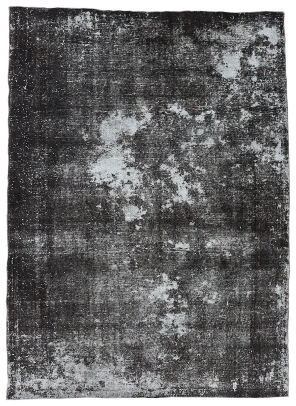 Full overhead view of the charcoal and gray distressed vintage Anatolian area rug