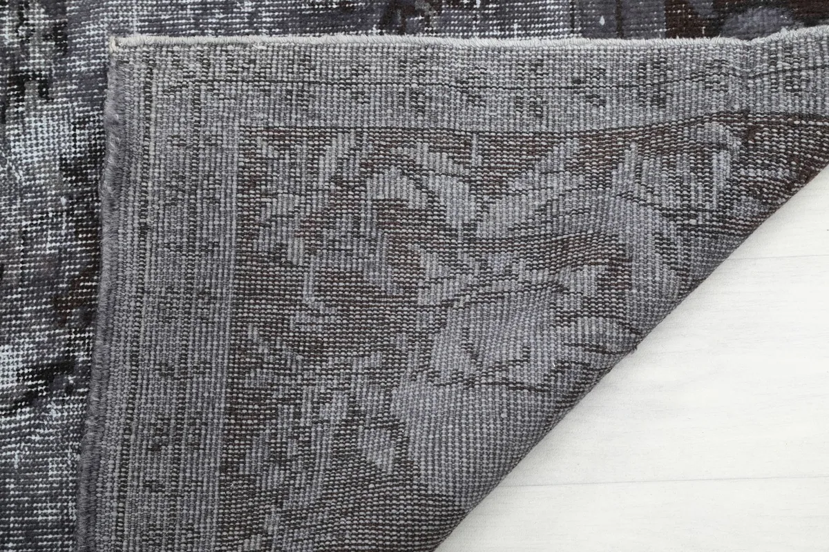 Close-up of the reverse side of the rug, showing the dense knotting and craftsmanship