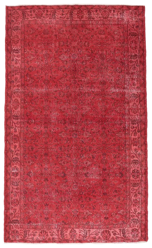 Full overhead view of the 5'2" x 8'11" red vintage Anatolian rug on a white background.
