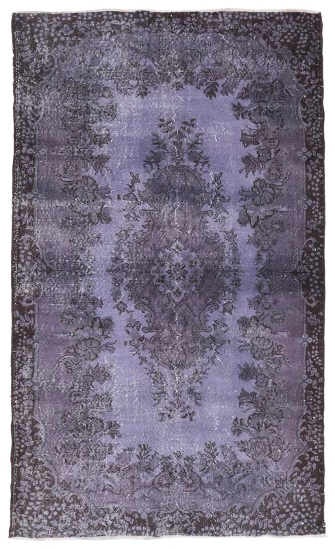 Full top view of the 5'3" x 9'0" vintage purple and charcoal Anatolian area rug