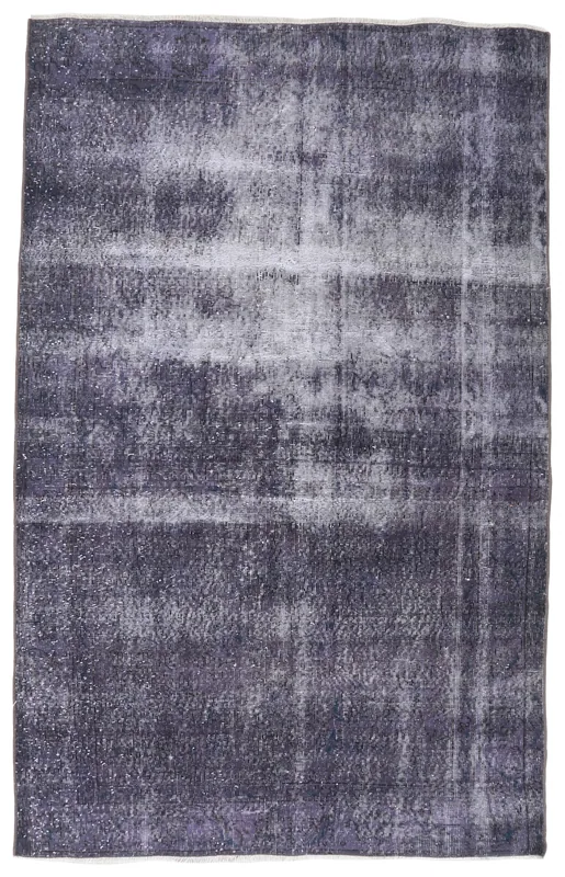 Full top view of the charcoal and gray vintage Anatolian rug on a white background.
