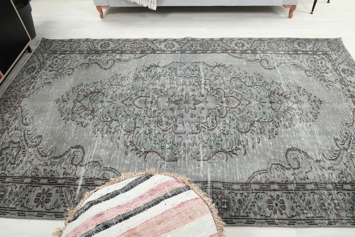 Overhead perspective of the rug, emphasizing its overall pattern and distressed finish