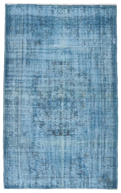 Full overhead view of the blue distressed medallion vintage Anatolian area rug