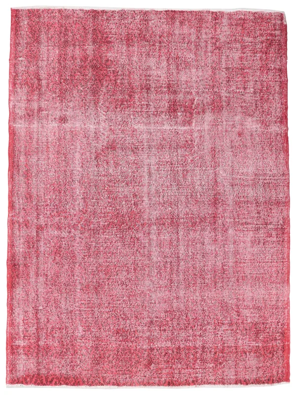 Full overhead view of the rose distressed vintage Anatolian rug on a white background