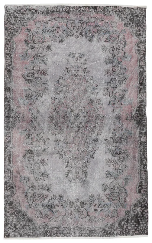 Full overhead view of the vintage rose and gray floral medallion rug