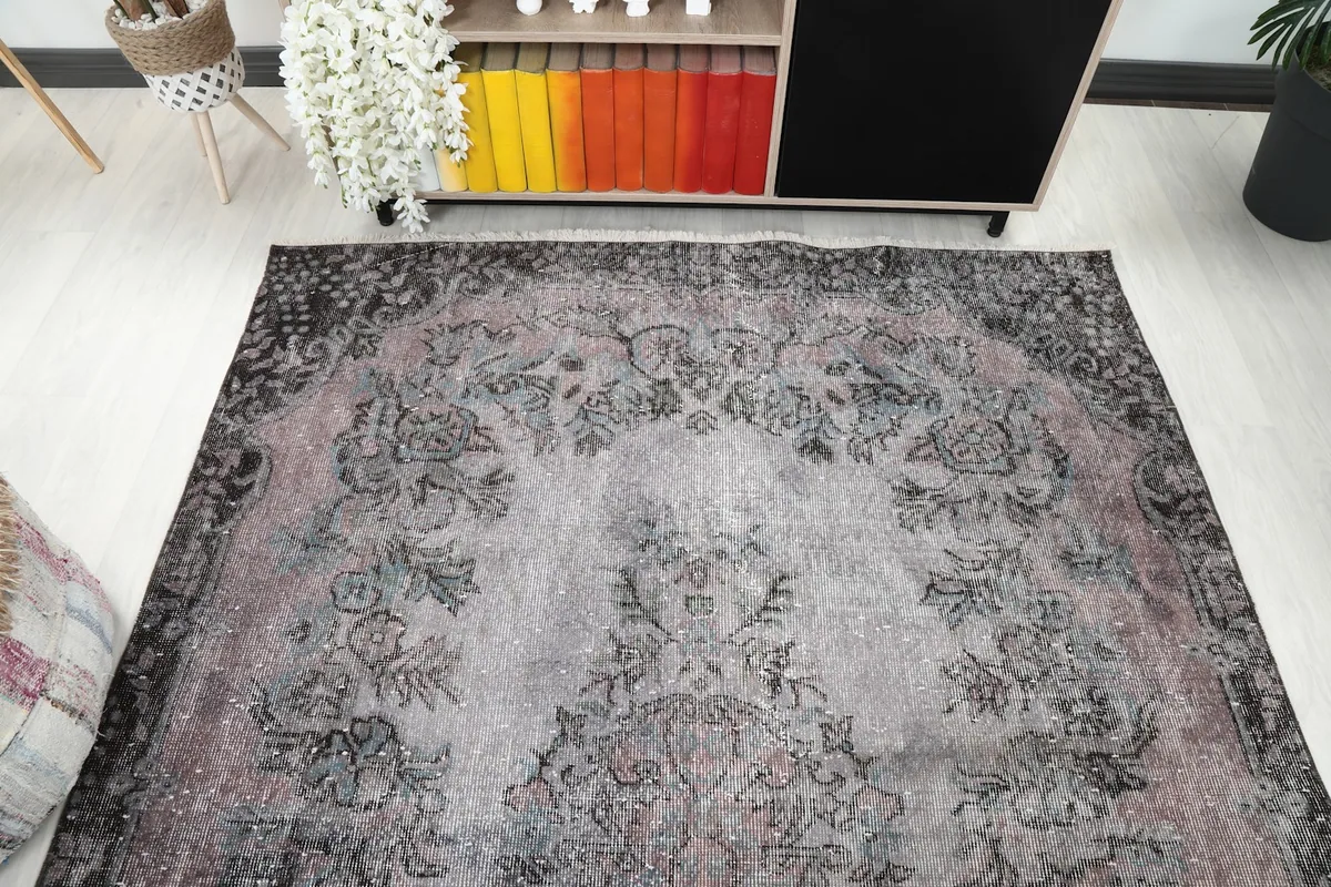 Overhead view of the rug, focusing on the main medallion and surrounding patterns