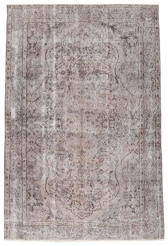 Full top view of the 5'6" x 8'3" charcoal gray vintage Anatolian rug with floral medallion design.