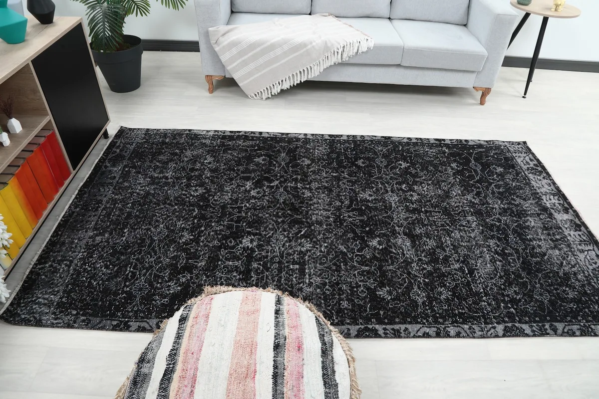 Wide shot of the rug in a room, offering a sense of its scale and how it fits the space