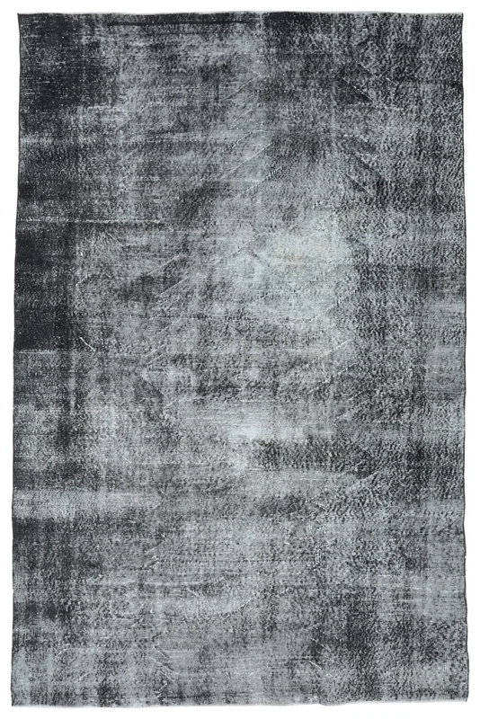 Full overhead view of the 6'7" x 10'4" charcoal and gray distressed vintage Anatolian rug