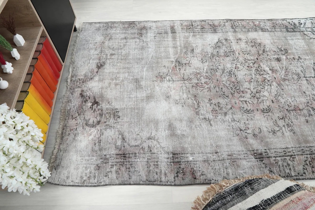 Side angle view of the rug, illustrating its placement and how light affects its appearance