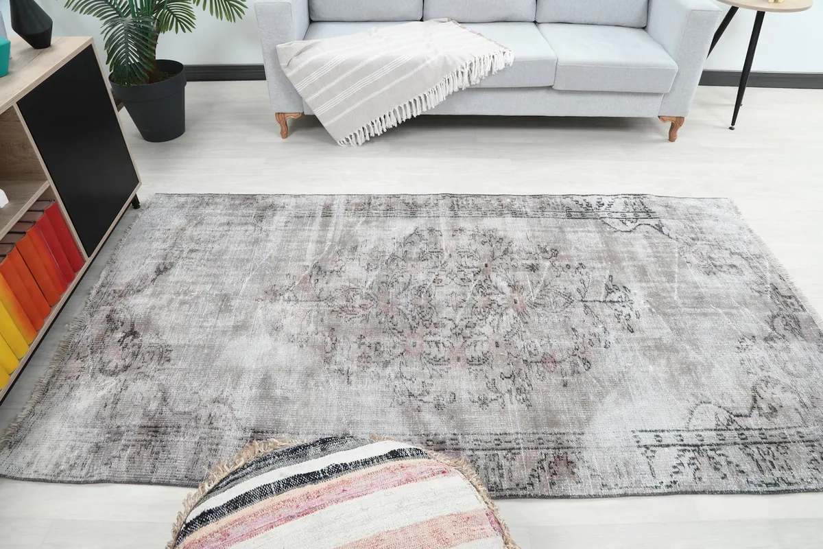 Wide shot of the rug in a living room, providing a sense of its scale within a space