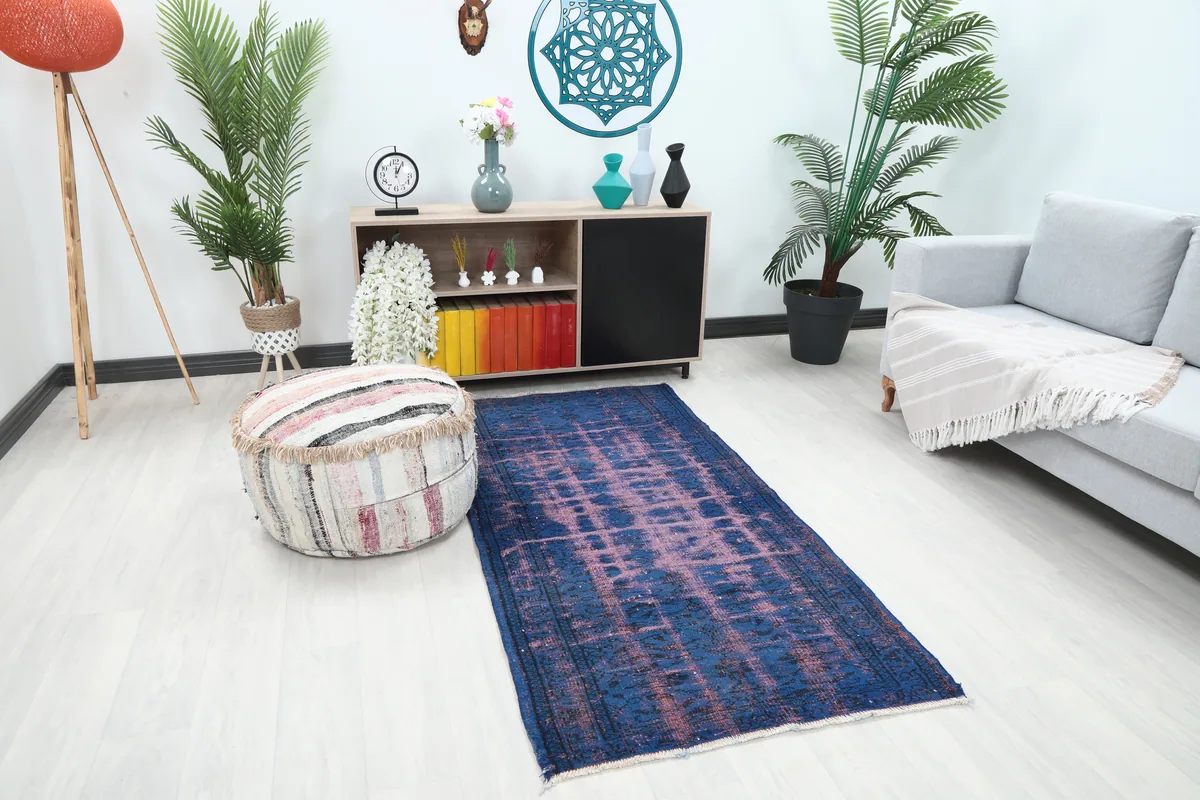 Blue Rose Distressed Anatolian Rug angled view in a contemporary living space