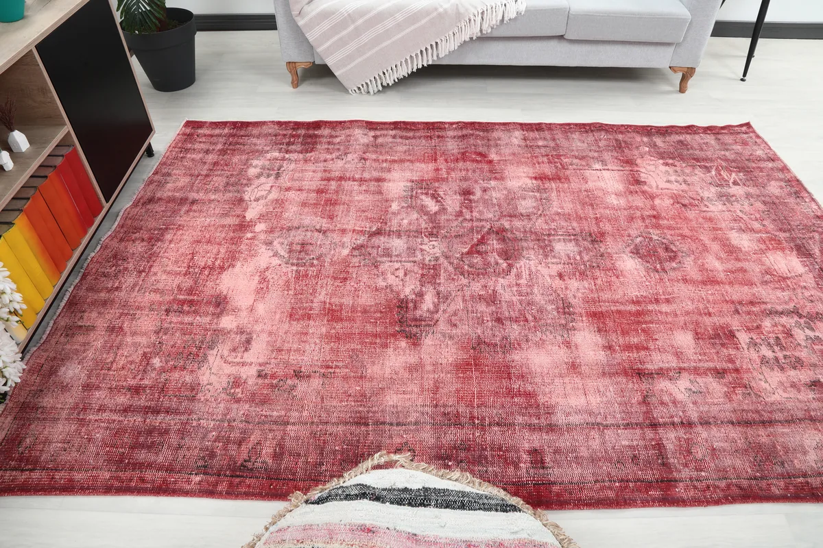 Faded Rose Geometric Vintage Rug in a room, demonstrating how it complements contemporary decor.