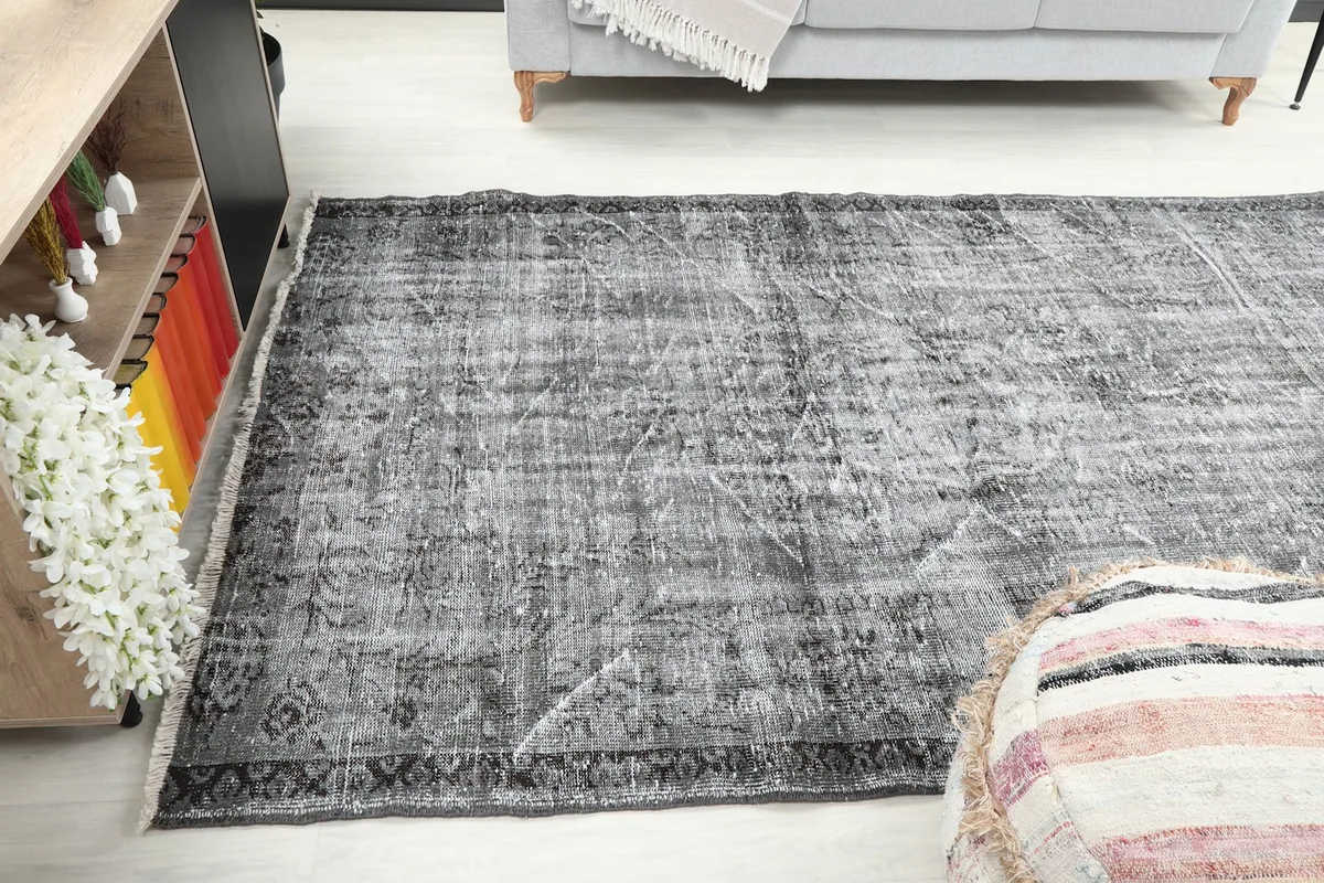 Angled view of the rug in the living space, showing its full length and width
