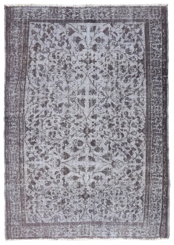 Full overhead view of the charcoal gray floral vintage Anatolian area rug