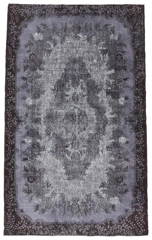 Top view of the charcoal gray medallion vintage Anatolian rug