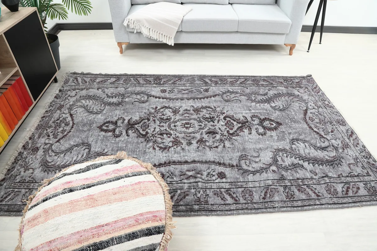 Full view of the rug laid out in a room, offering perspective on its scale
