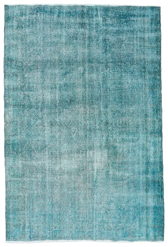 Full top view of the 6'11" x 10'1" vibrant blue vintage Anatolian rug on a white background.