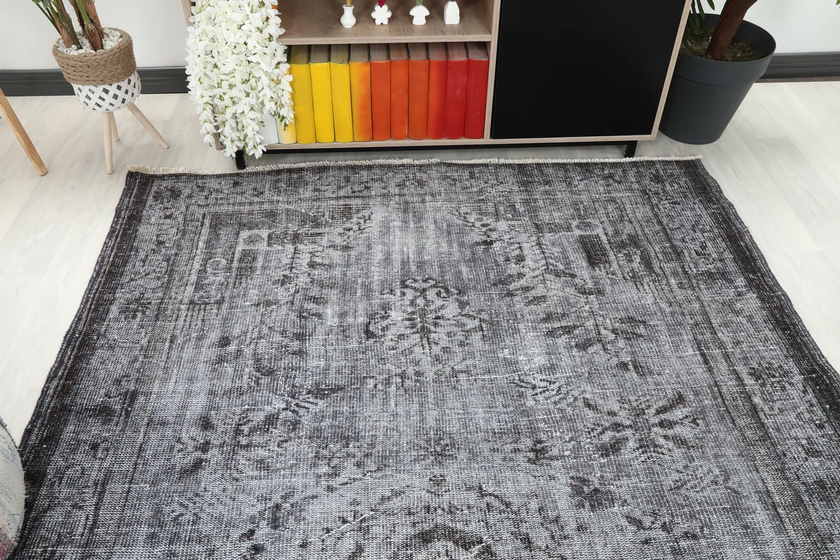 Charcoal Medallion Anatolian Rug in a room setting, showing its placement relative to furniture