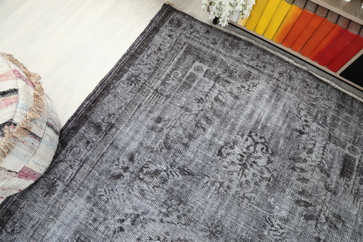 Overhead angle shot of the Charcoal Medallion Anatolian Rug, highlighting its overall design