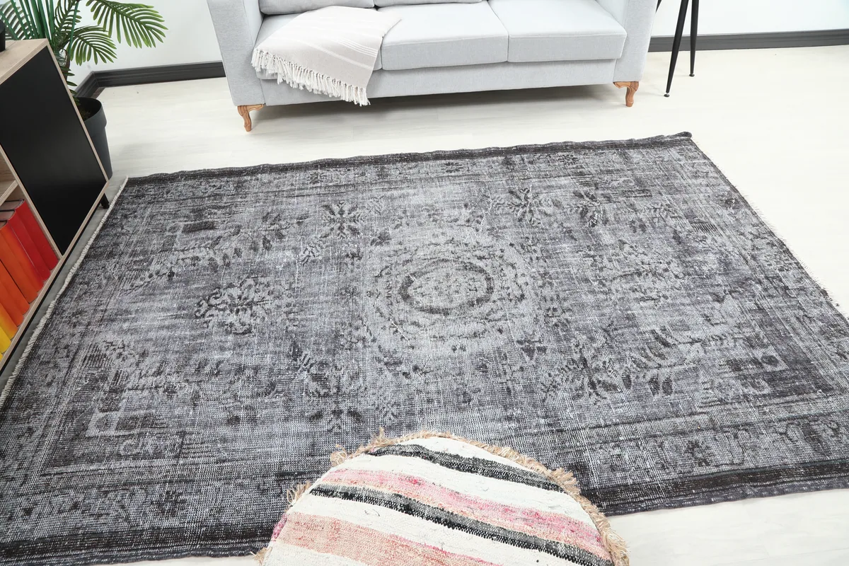 Charcoal Medallion Anatolian Rug in a living space, emphasizing its harmonious blend with decor