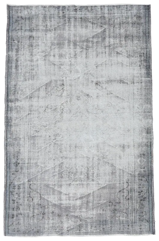 Full overhead view of the gray vintage Anatolian area rug with subtle medallion pattern