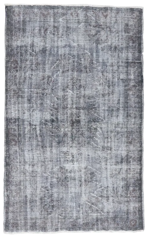 Full overhead view of a charcoal gray distressed vintage rug