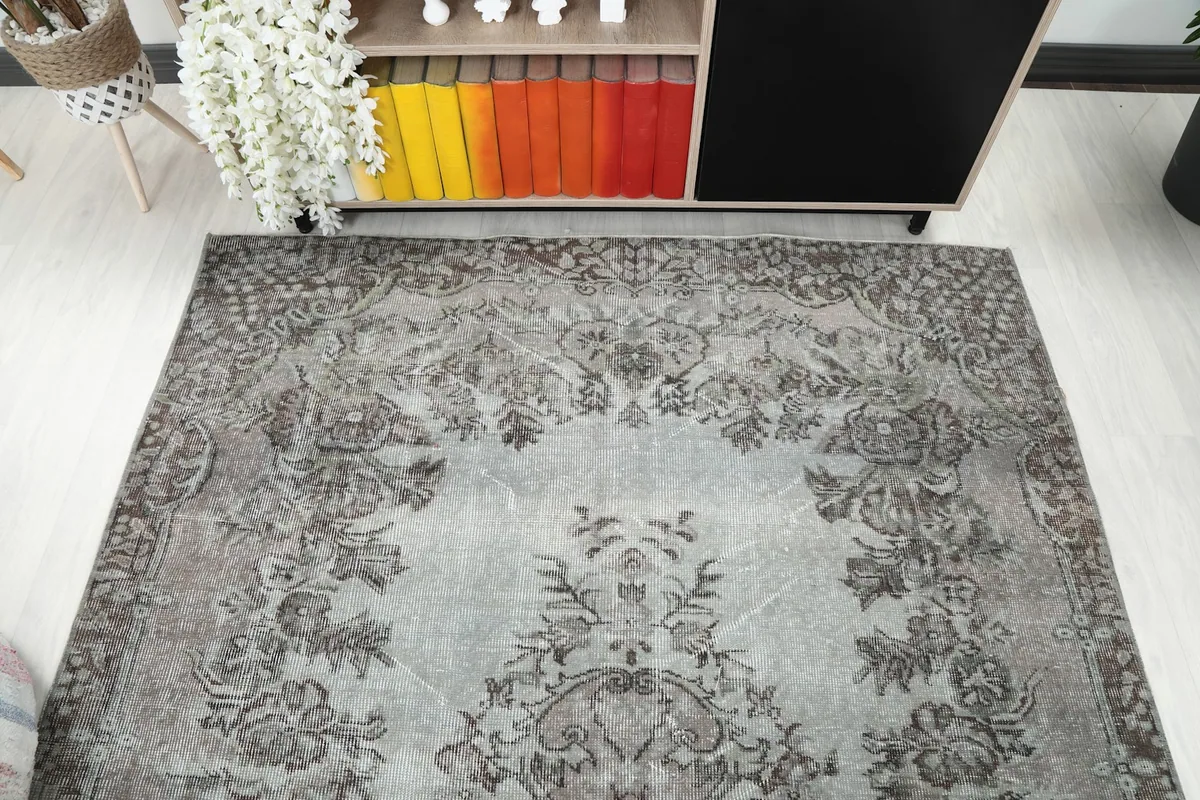 Overhead view of the rug, emphasizing the full design from one end to the center