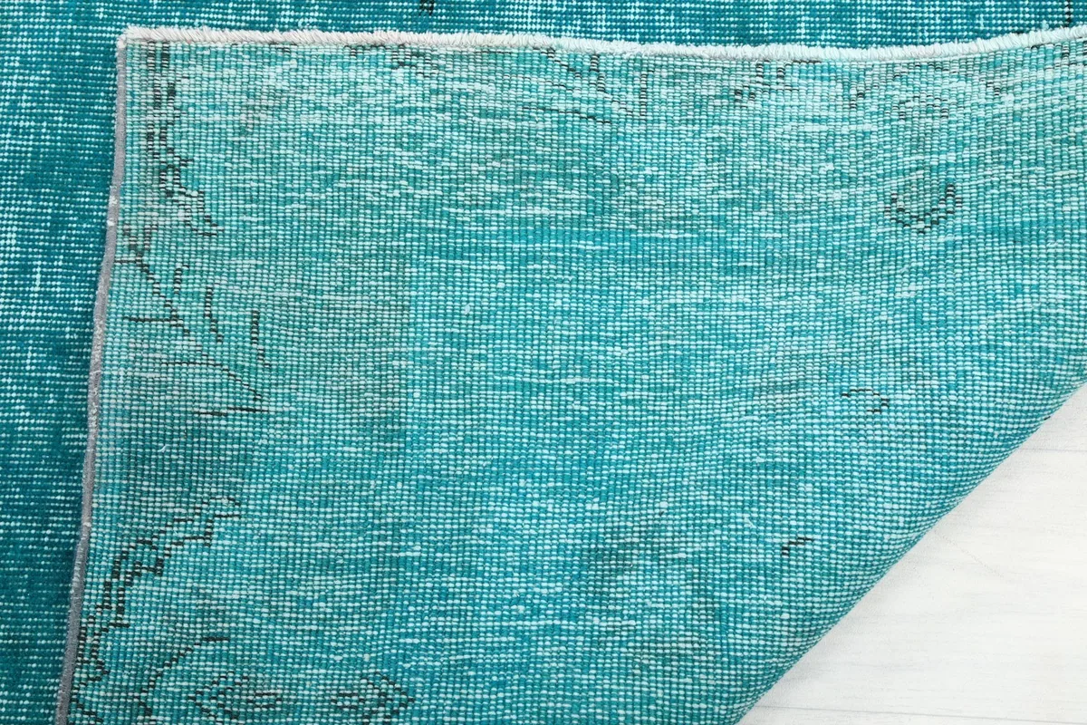 Close-up of the reverse side of the rug, detailing the hand-knotted construction