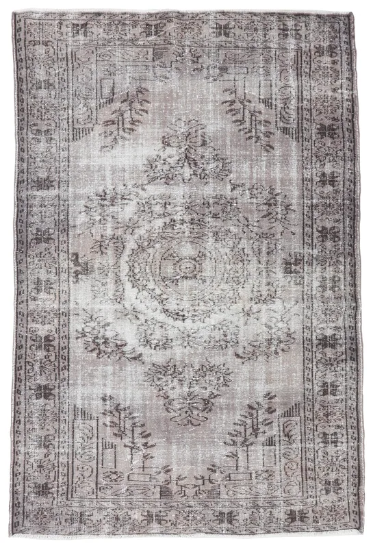 Full top view of the charcoal and gray vintage Anatolian rug with a central medallion
