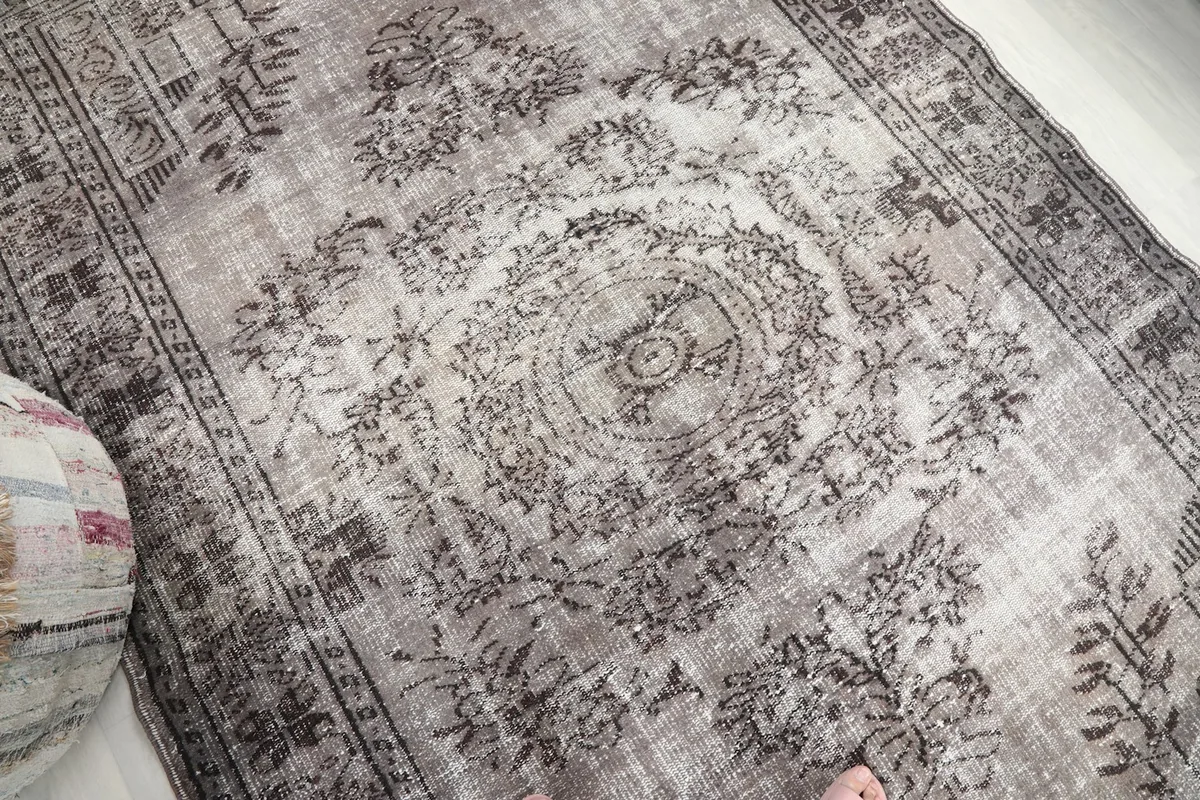 Detailed view of the rug's surface and medallion from an overhead angle