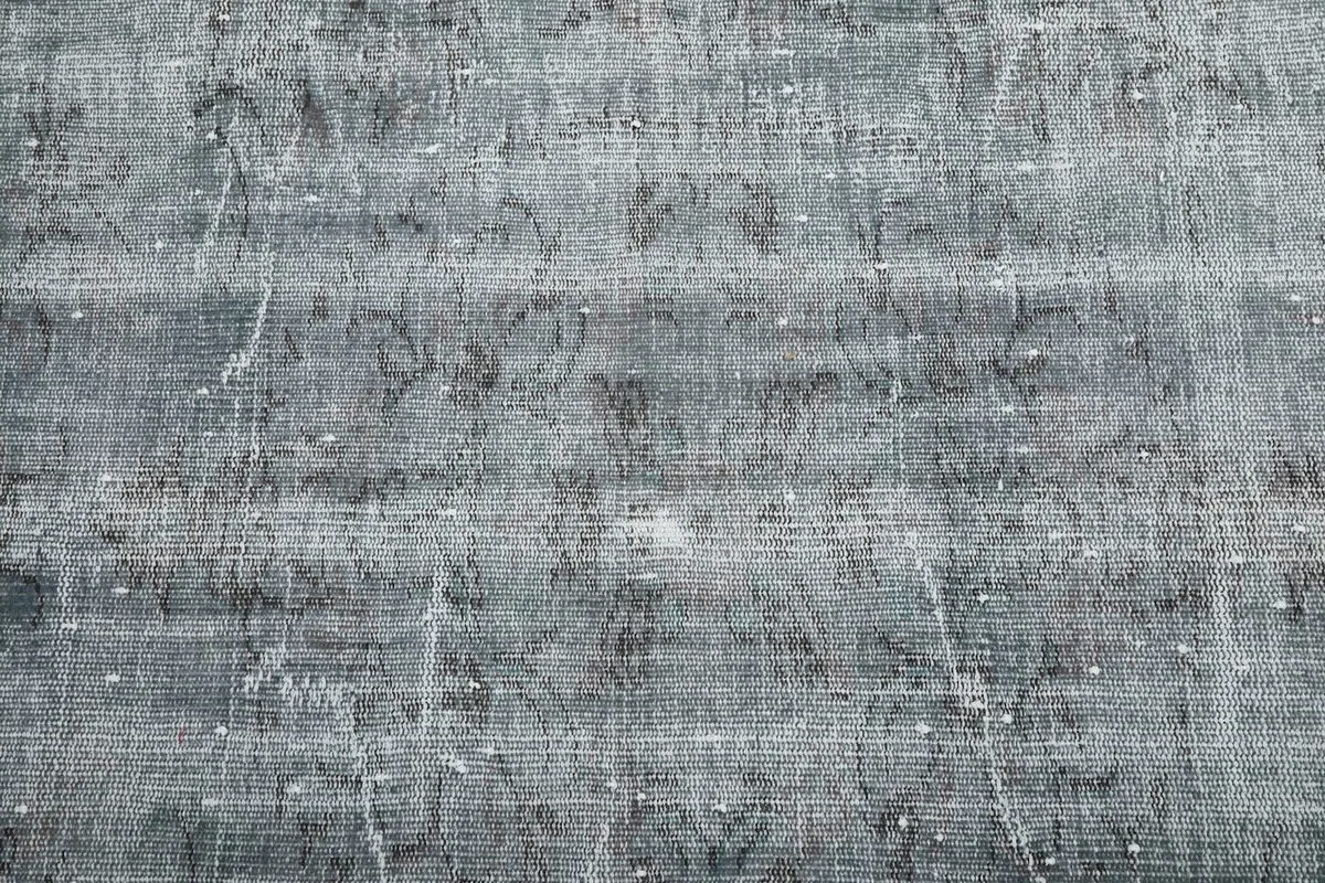 Close-up of the rug's surface, highlighting the low pile and textured appearance