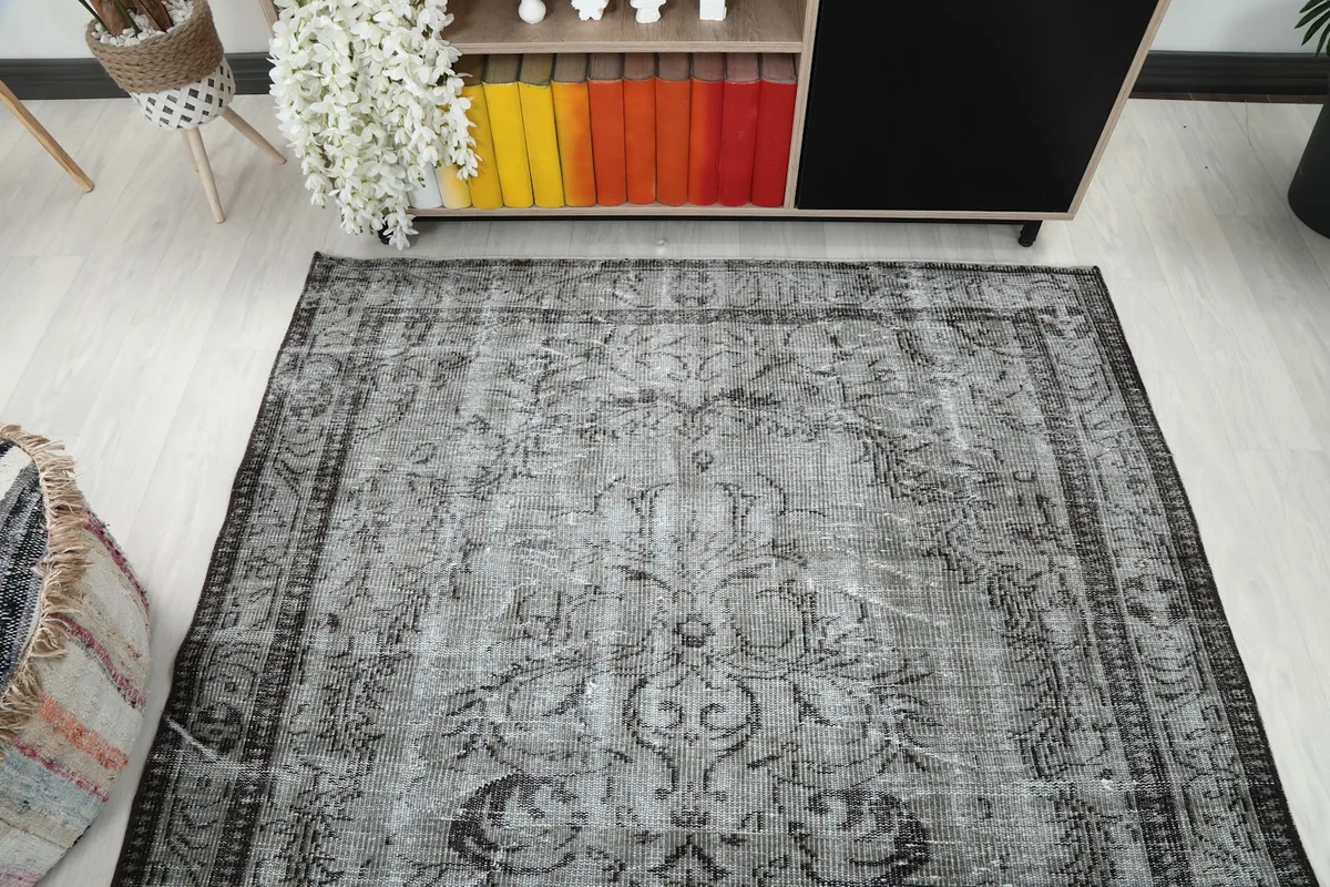Overhead perspective of the vintage rug highlighting its overall design
