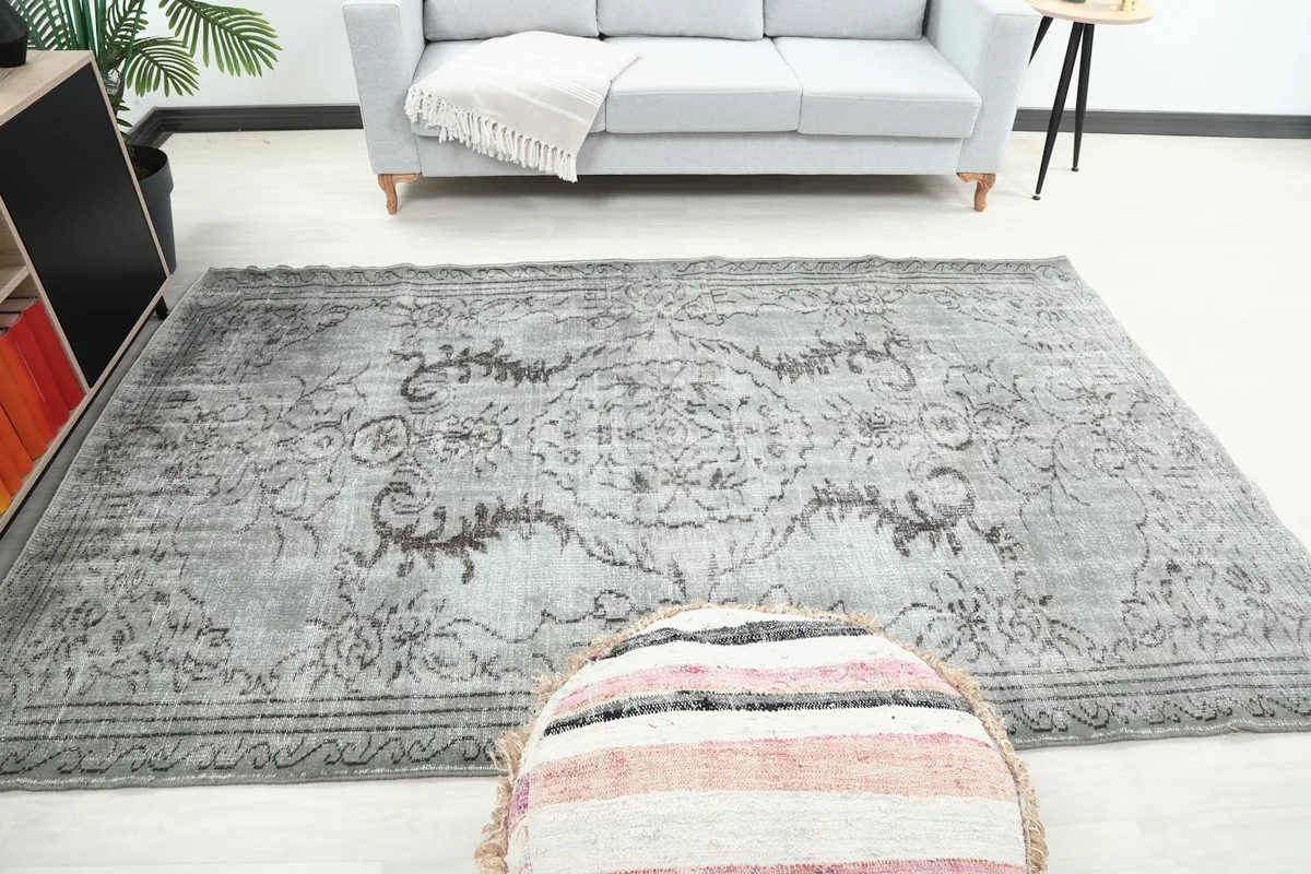 Full view of the rug in a living room, showcasing its size and how it anchors the space.