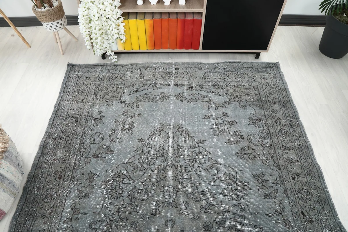 Overhead shot of the blue and gray rug, emphasizing its full design and colors
