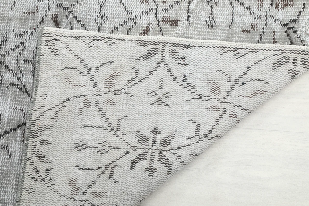 Close-up of the back of the Gray Floral Anatolian Rug, showing the hand-knotted construction.