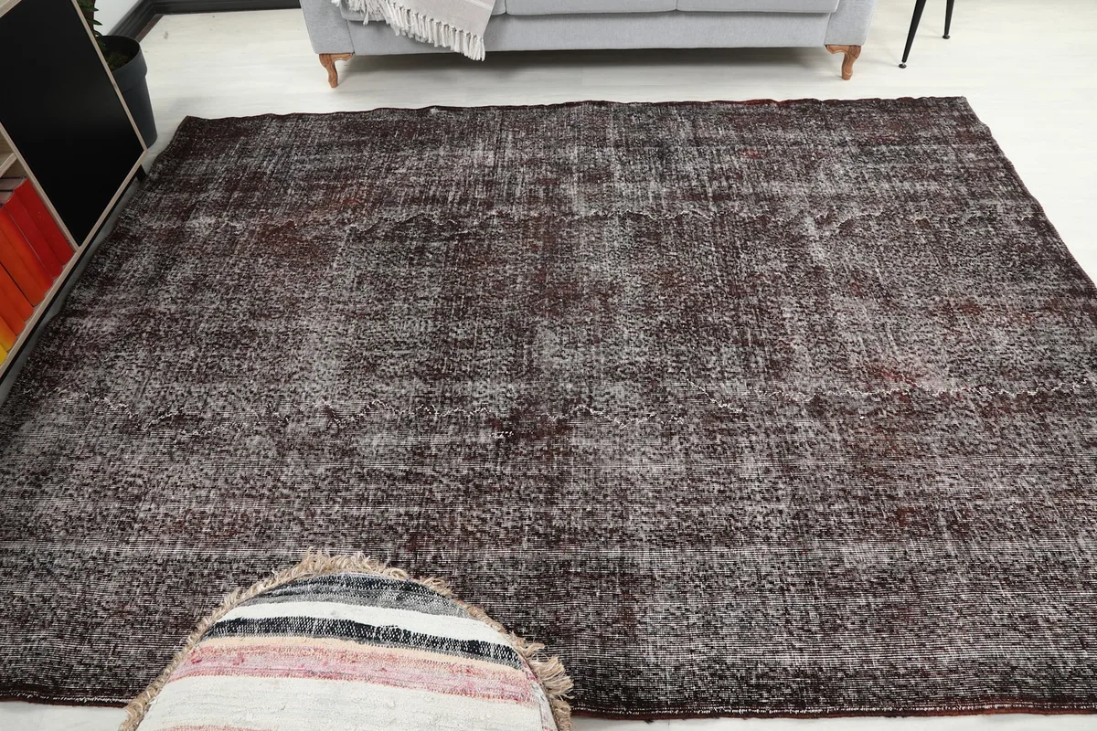 Overhead shot of the rug in a room, illustrating its rectangular shape and pattern