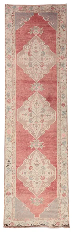 Full top view of the vintage Anatolian runner rug with rose and beige geometric patterns