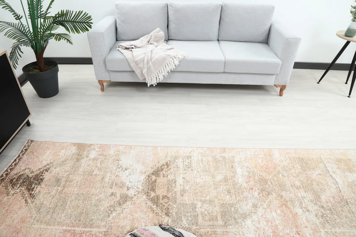 Overhead view of the runner rug extending from a seating area in a contemporary room